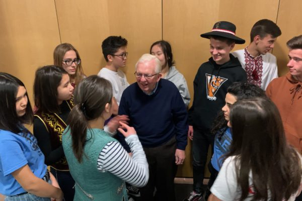 Paul Woodard with World Link students attending Cantus concert, December 2019